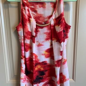 Multi colored woman’s top Size L gold bar accent